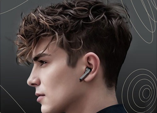 a man with a TWS earphone in his ear