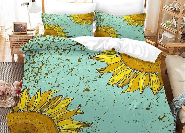 a bed with a bed and a bed with a blue and yellow sunflower print
