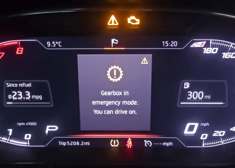 Digital car dashboard displaying a gearbox in emergency mode warning light and check engine notification.