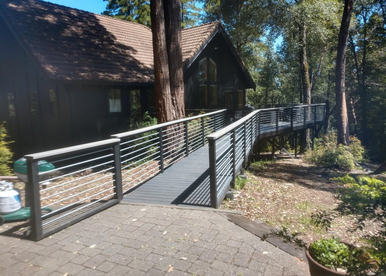  a walkway with a bridge over it