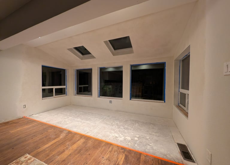 A remolded room with windows