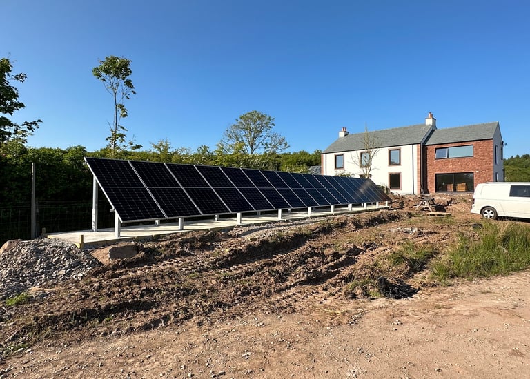 off grid home with 18 bi facial solar panels on a ground mount array