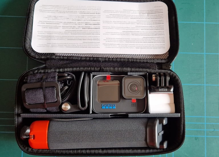 a case with a camera and a cell phone