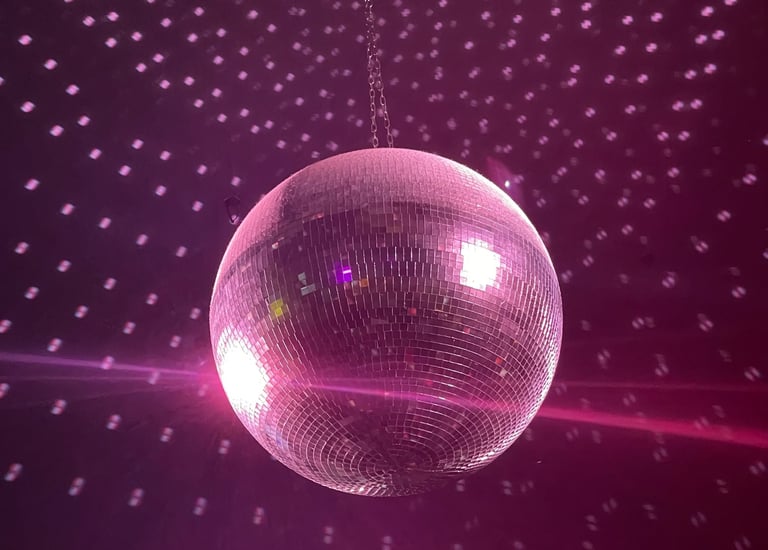 a disco ball hanging from a ceiling