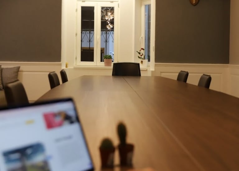 a person work in coworking space in Old Town on a laptop
