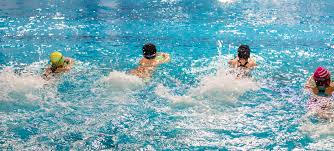 kids swimming in the pool