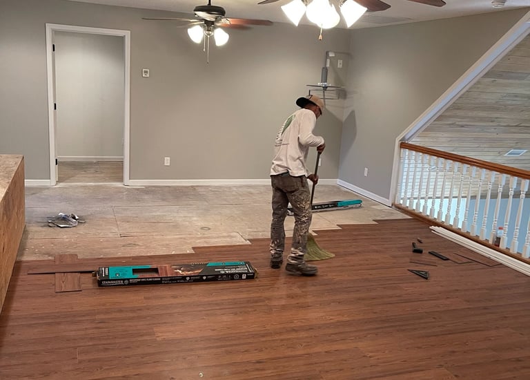 man shirts remodeling company garnet painting llc cleaning work station where he is installing moder