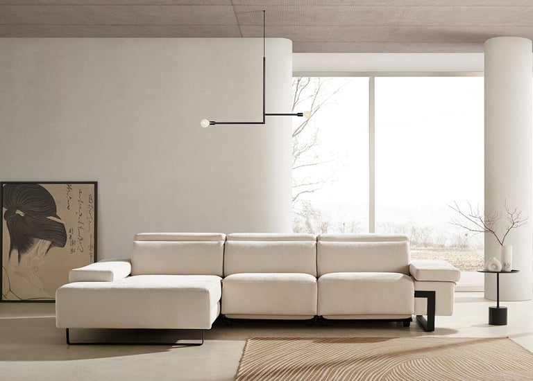 a living room with a couch and a large window