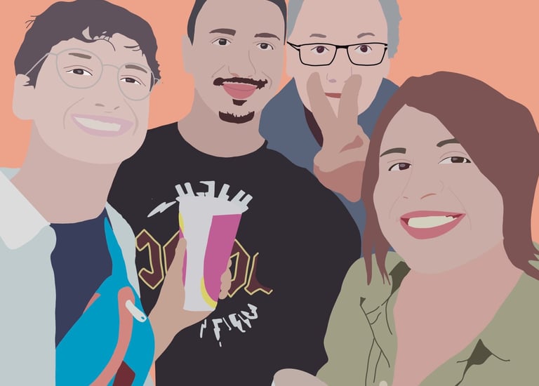 a group of people standing around a table