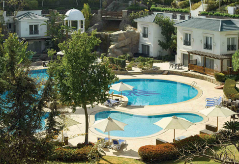 Mountain View iCity New Cairo apartments and villas with swimming pool view