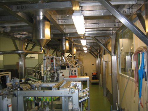 a room with stainless steel machinery