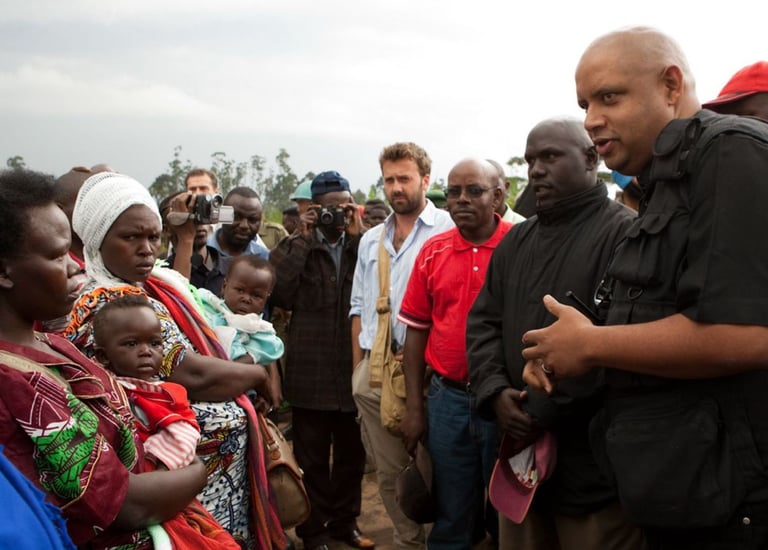 Former senior UN official Bruno Donat meeting women in eastern DR Congo circa 2008