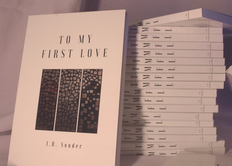 A stack of J.R. Sonder's book To My First Love (TMFL)