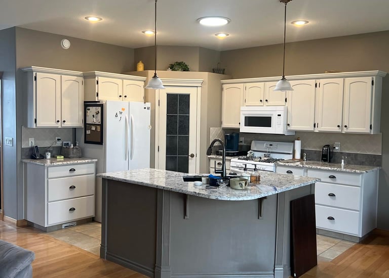 recently completed cabinet painting. refinished cabinets in innisfail