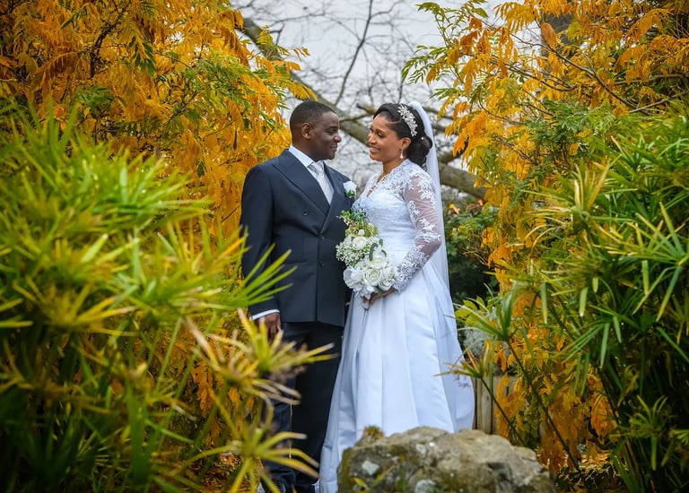 Wedding couple posing for a photograph