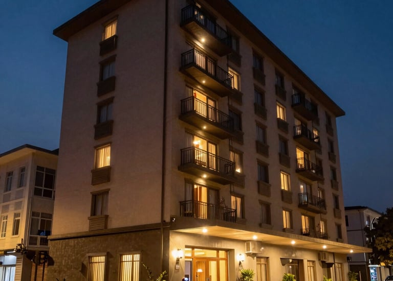 Luxurious hotel lobby bathed in warm light with elegant decor and welcoming atmosphere.