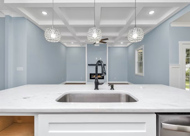 a kitchen with a sink and a dishwasher