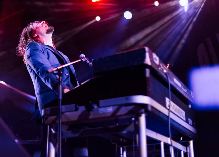 Captivating moments from Lachy Doley performance expertly captured by event photographer.