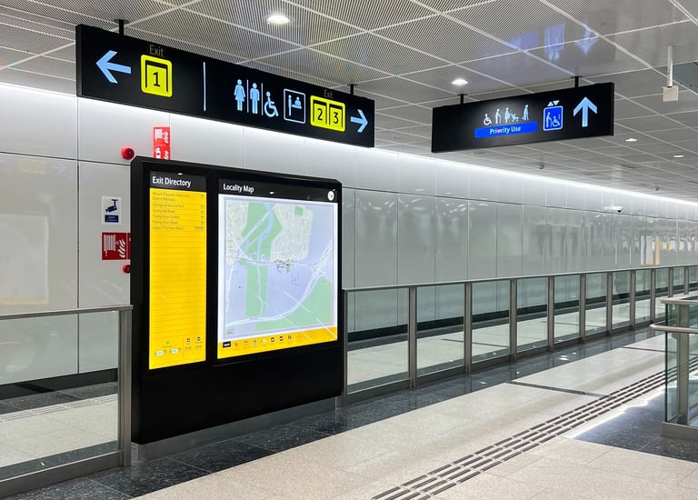 newly revamped Singapore MRT signage system, featuring new direction and information signs