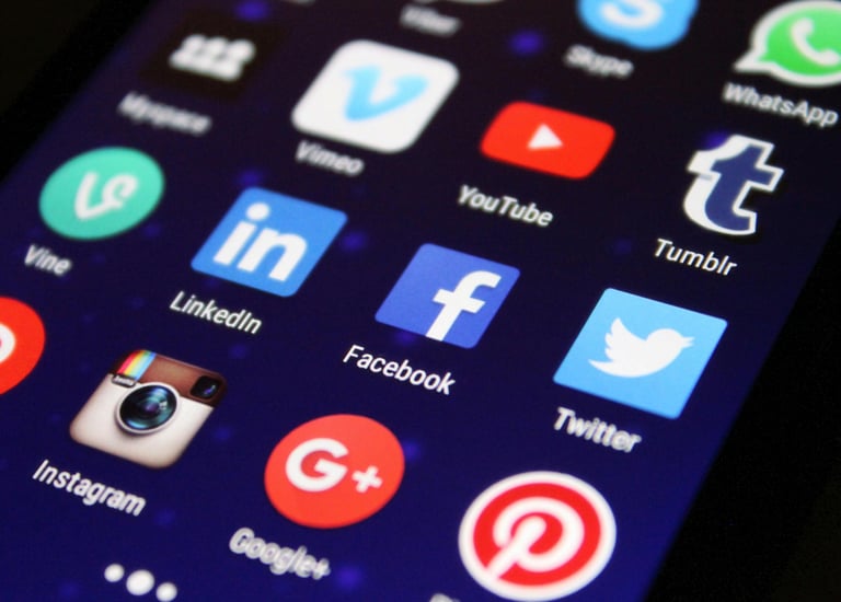 a cell phone with a bunch of social media icons