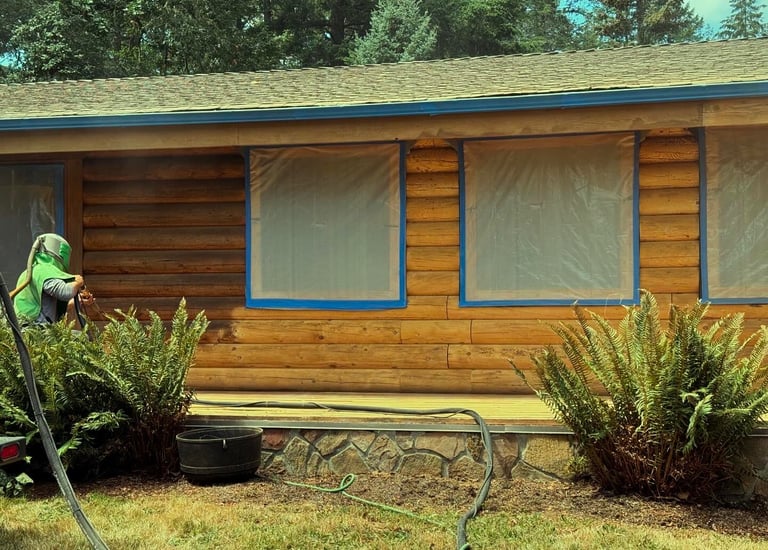 40 years of old stains removed for a fresh coat on this Log Home!