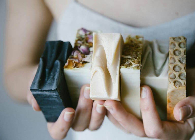 a woman holding a piece of food in her hands
