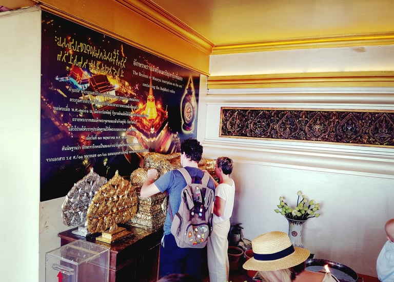 Lady Michelle and Steven take part in the ceremony at Wat Saket in Bangkok