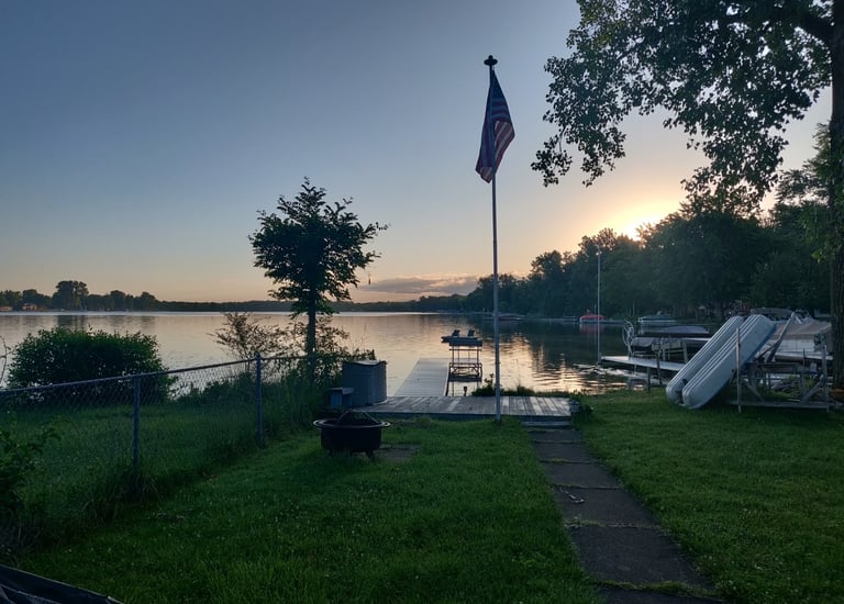 Lake view with paddleboat vrbo airbnb dock short term rental