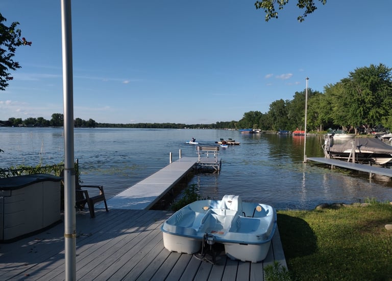 Lake view with paddleboat vrbo airbnb dock short term rental