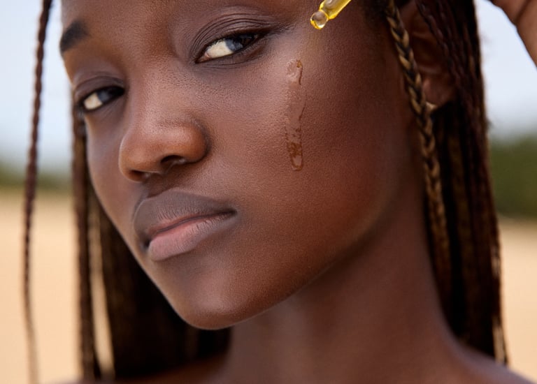 a woman with a yellow liquid in her hair