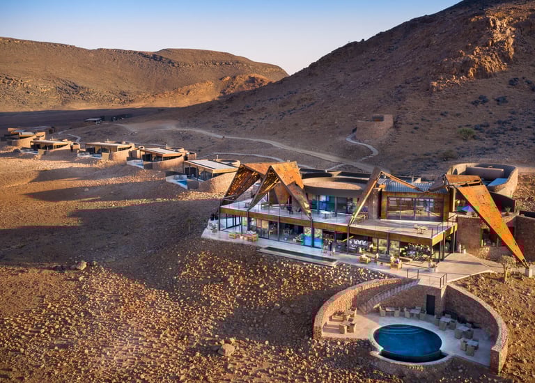 a desert landscape with a pool and a pool