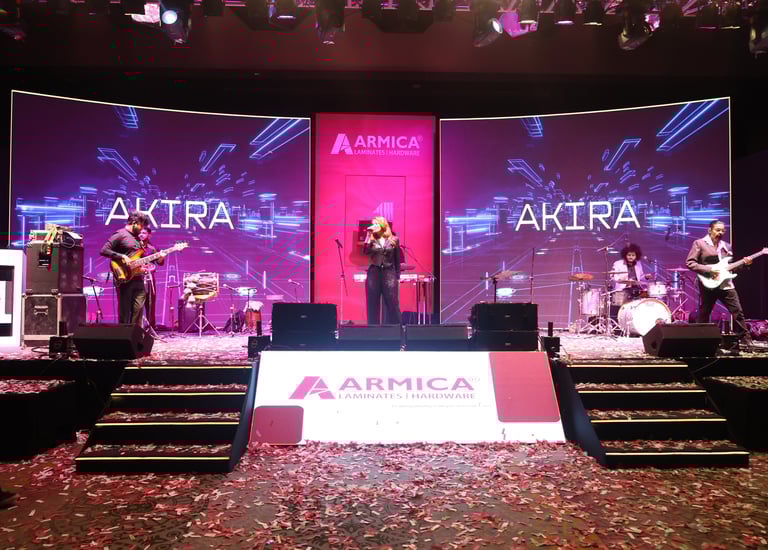 a band playing a song on stage at an event