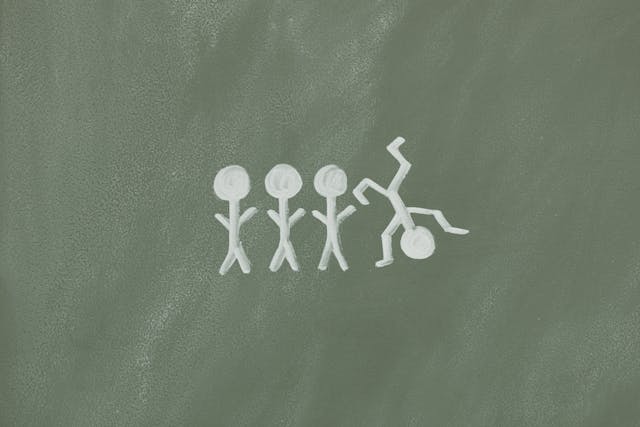 a chalkboard with a drawing of a man and a woman