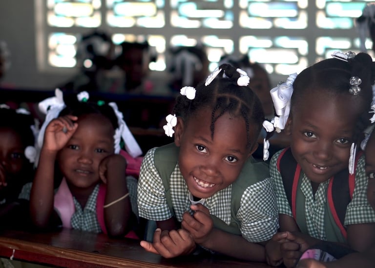 Group of young girls accessing education through an NGO program.