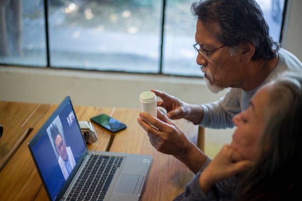 a man and woman sitting at a table with a cup of coffee, virtual therapy