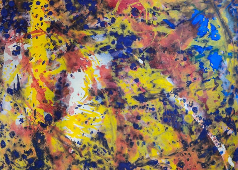 Abstract oil painting in yellow, red, and blue splashes with texture