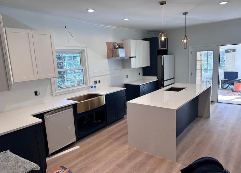 Modern kitchen with waterfall quartz island and matching edge