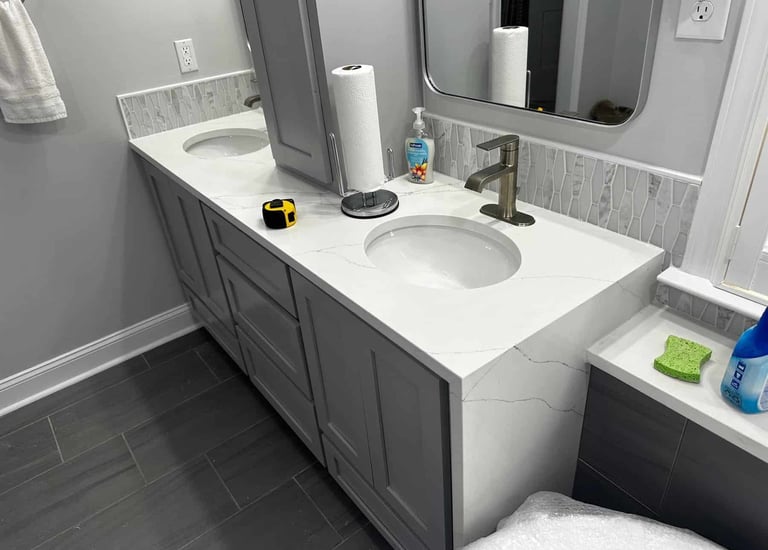 Waterfall edge design on custom stone countertop vanity