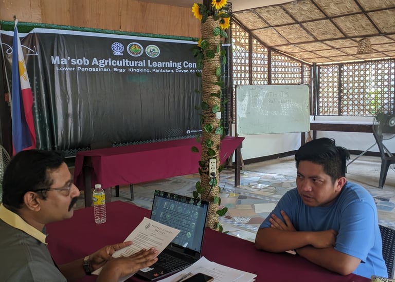 "Our consultant in discussion during a key informant interview KII Philippines"