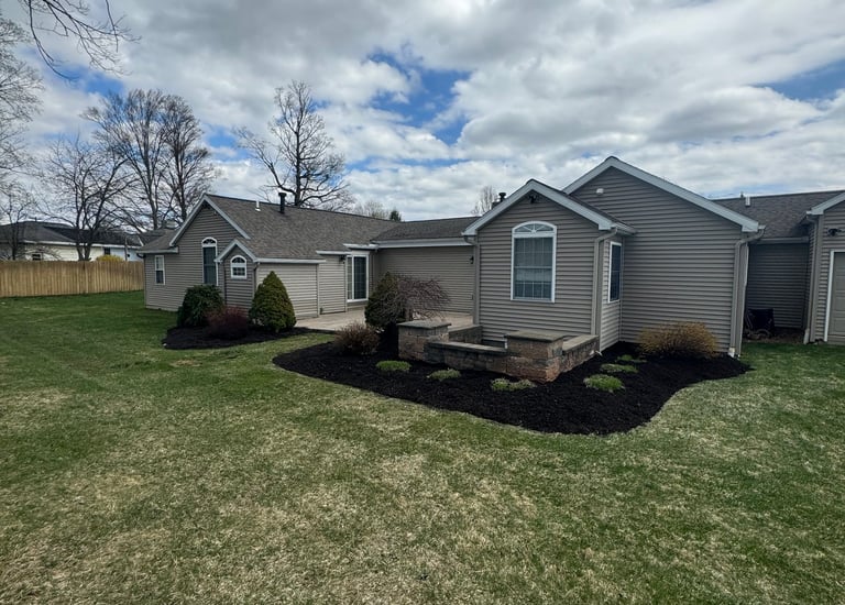 A freshly mulched garden bed