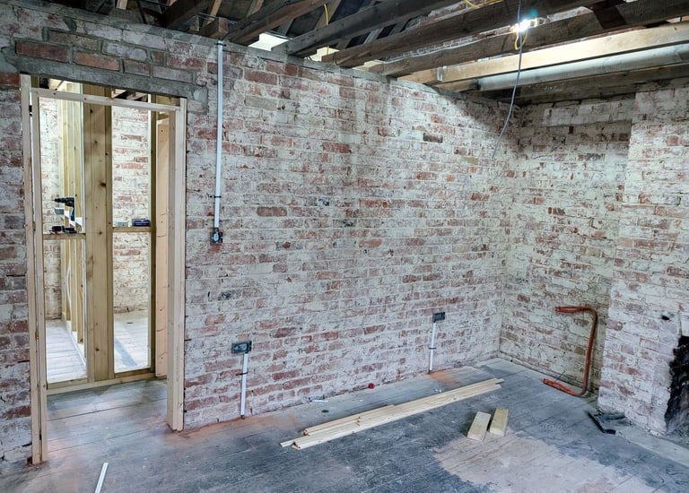 Exposed walls of a renovation and rewire at 1st fix stage. completed by RAD Energise