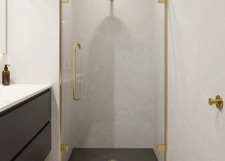 Elegant modern kitchen with sleek cabinetry and warm lighting.