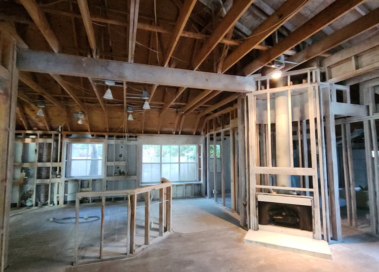 fire damage before restoration showing exposed framing - Irvin Restoration Irving TX