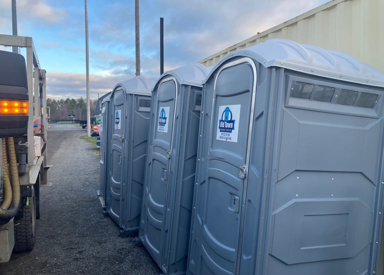 A row of portable toilets 
