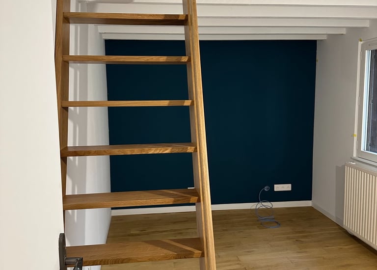 a loft apartment with a lofted lofted room and a lofted loft