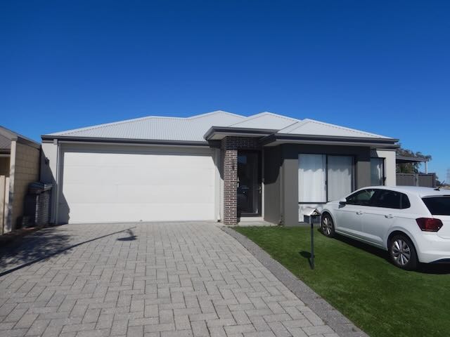 Brick & sheet metal roof property inspected for structural defects