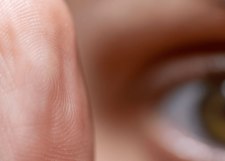 EMDR technique with eye processing movement a person's fingernails on a finger