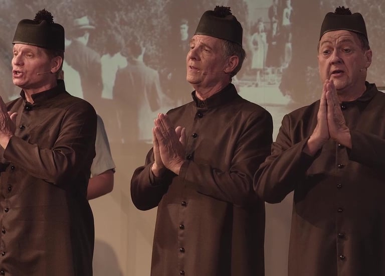 Three priest characters with hands in prayer. 