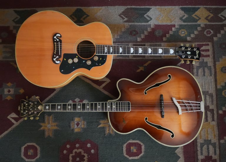 Two vintage guitars belonging to the band Sickle Moon