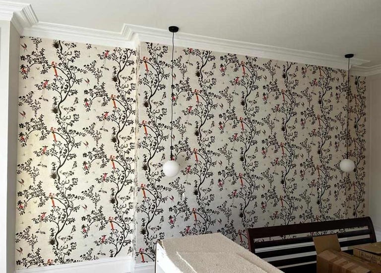 Floral wallpaper installation in living room, completed by Pure Perfection on Balham